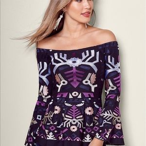 Venus embroidered peplum top.